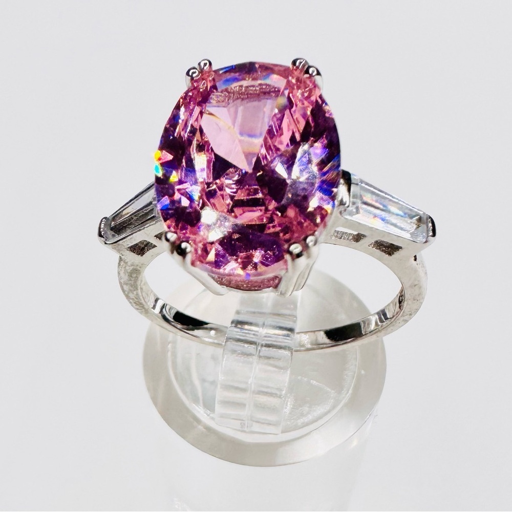 Elegant Sterling Silver Ring with Facet Cut Pink Gemstone and Baguettes